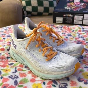 Hoka White and Orange Clifton 8 shoes